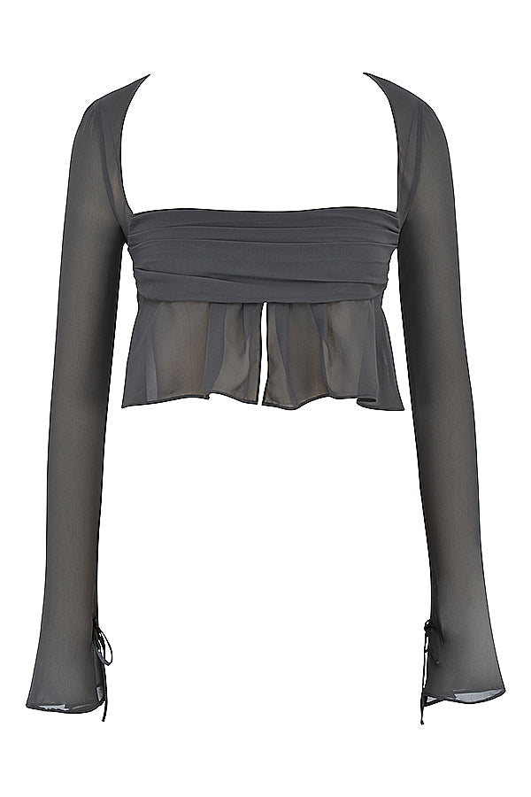 Top fluttuante a maniche lunghe Shadow e minigonna a strati