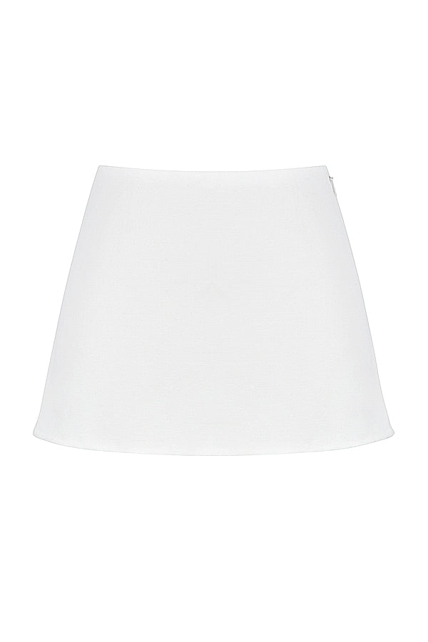Top in pizzo bianco con minigonna a trapezio in lino