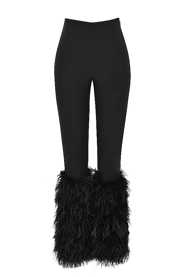 Corsetto di velluto nero con pantaloni cropped
