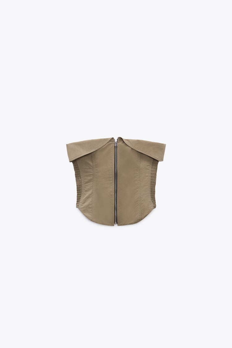 Bustier e pantaloni con cerniera in un set