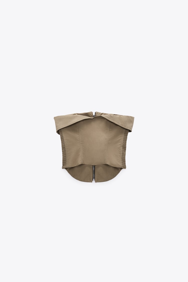 Bustier e pantaloni con cerniera in un set