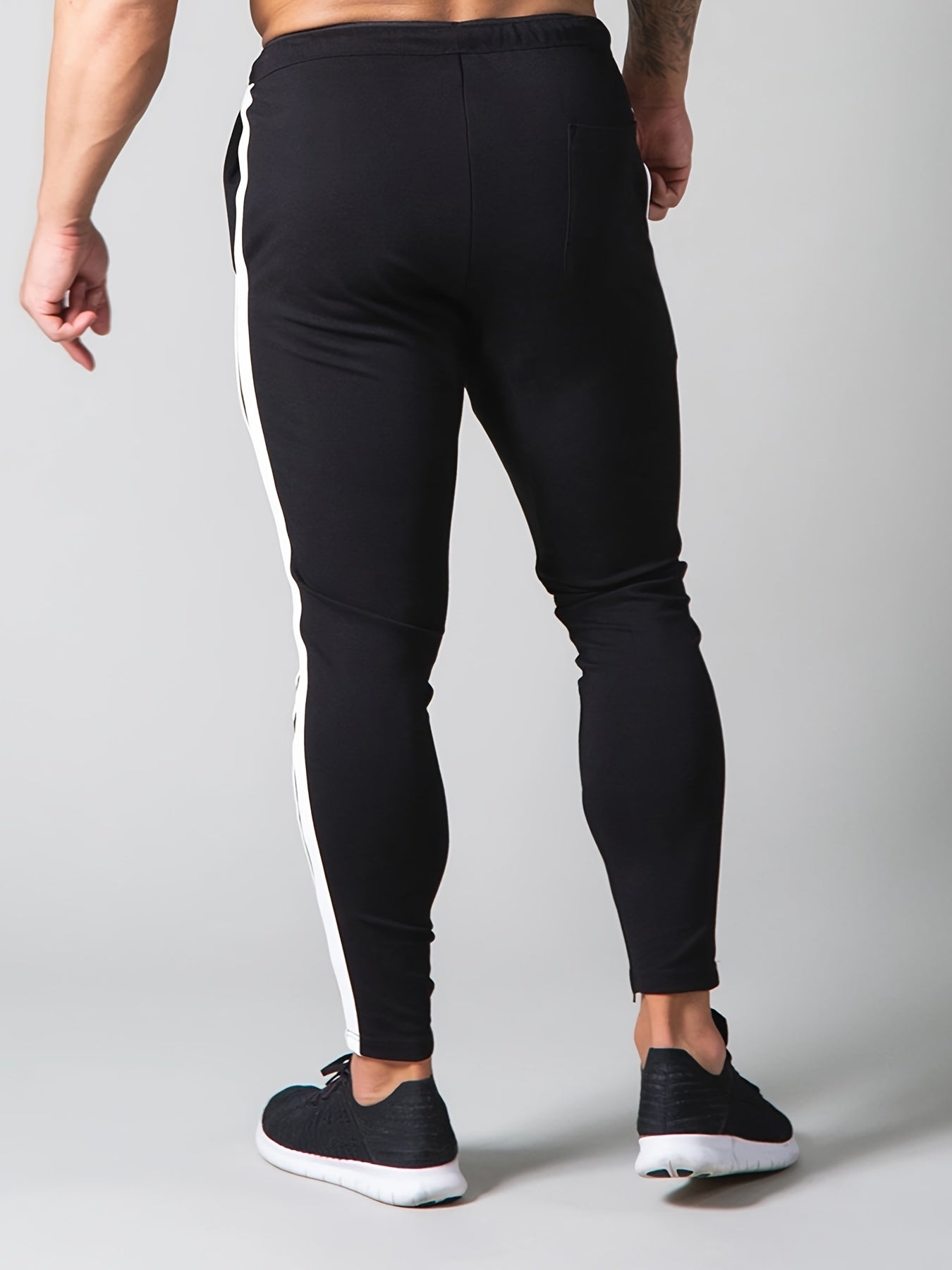 Pantaloni sportivi della tuta con motivo a righe