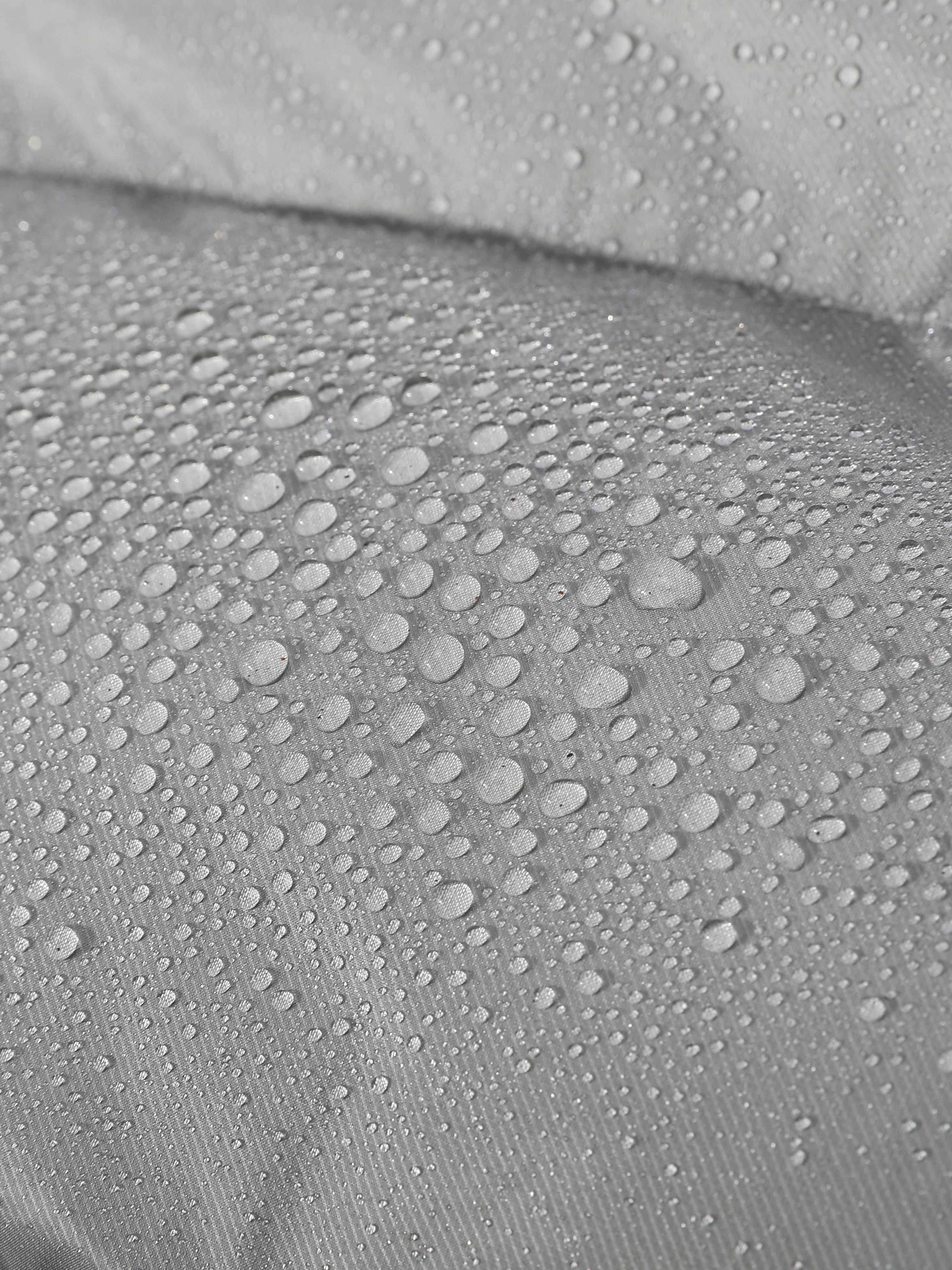 Piumino antivento con collo alto