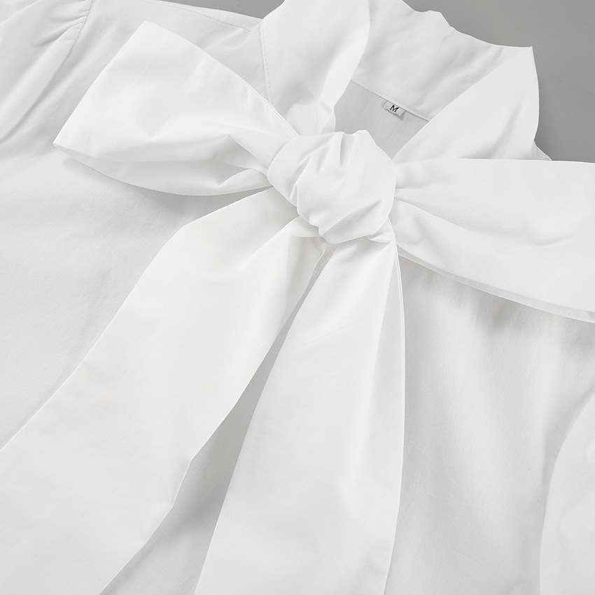 Camicia bianca con fiocco