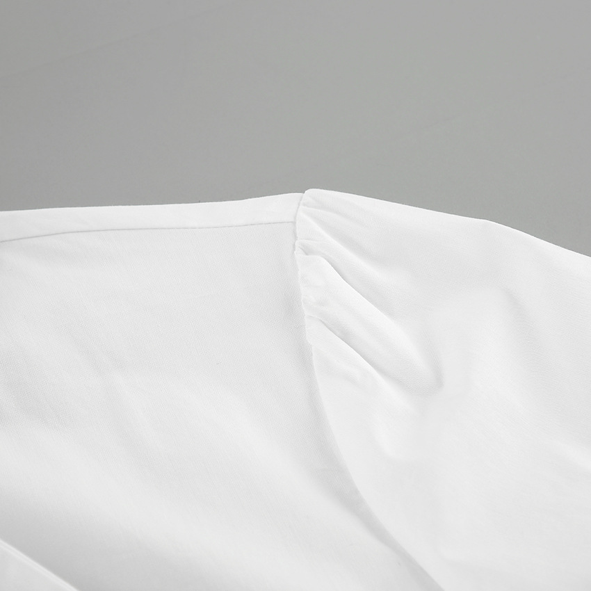 Camicia bianca con fiocco