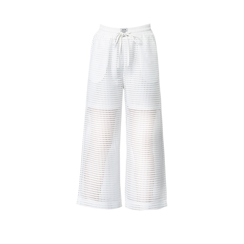 Pantaloni larghi bianchi trasparenti per l'estate