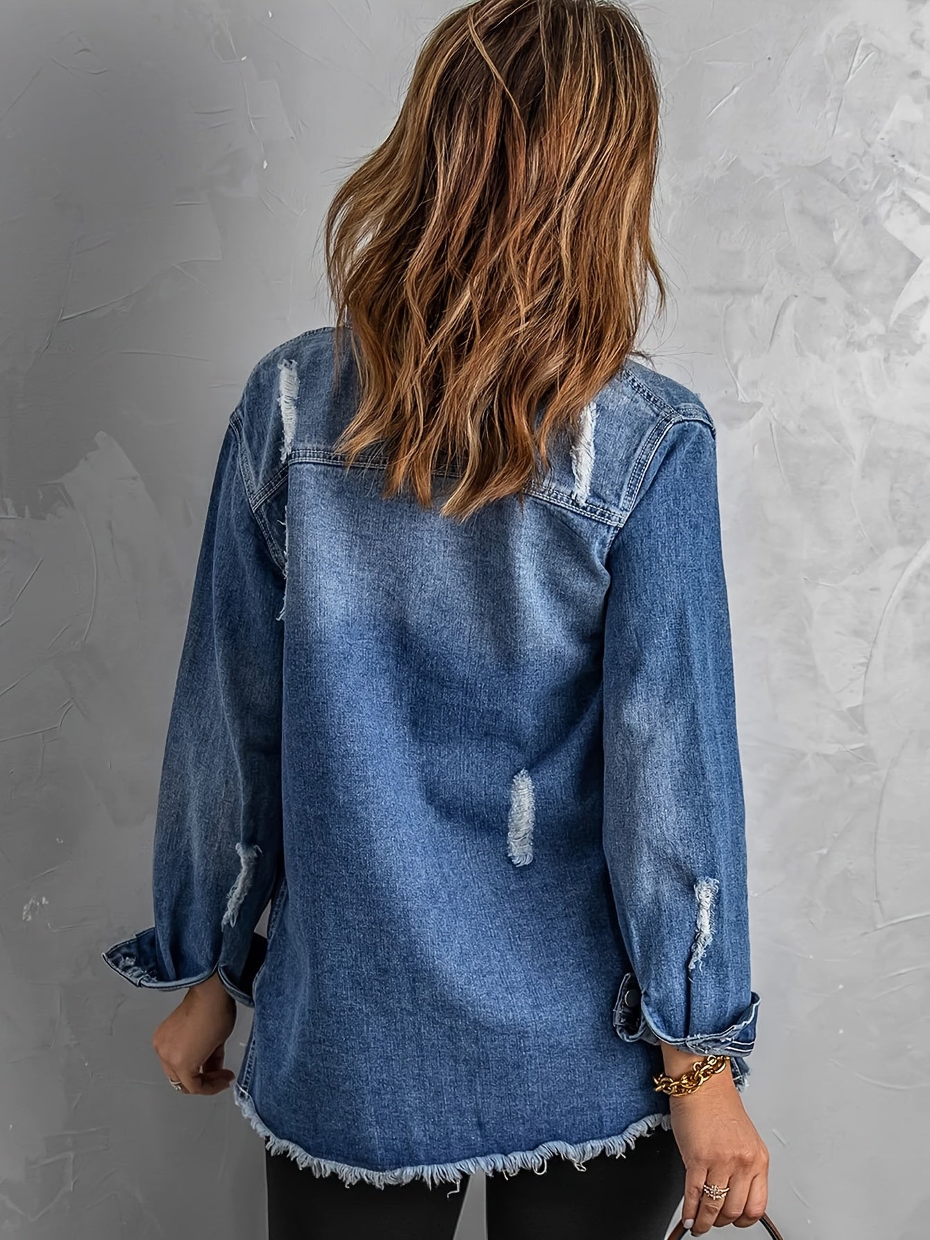 Giacca in denim con strappi sui revers