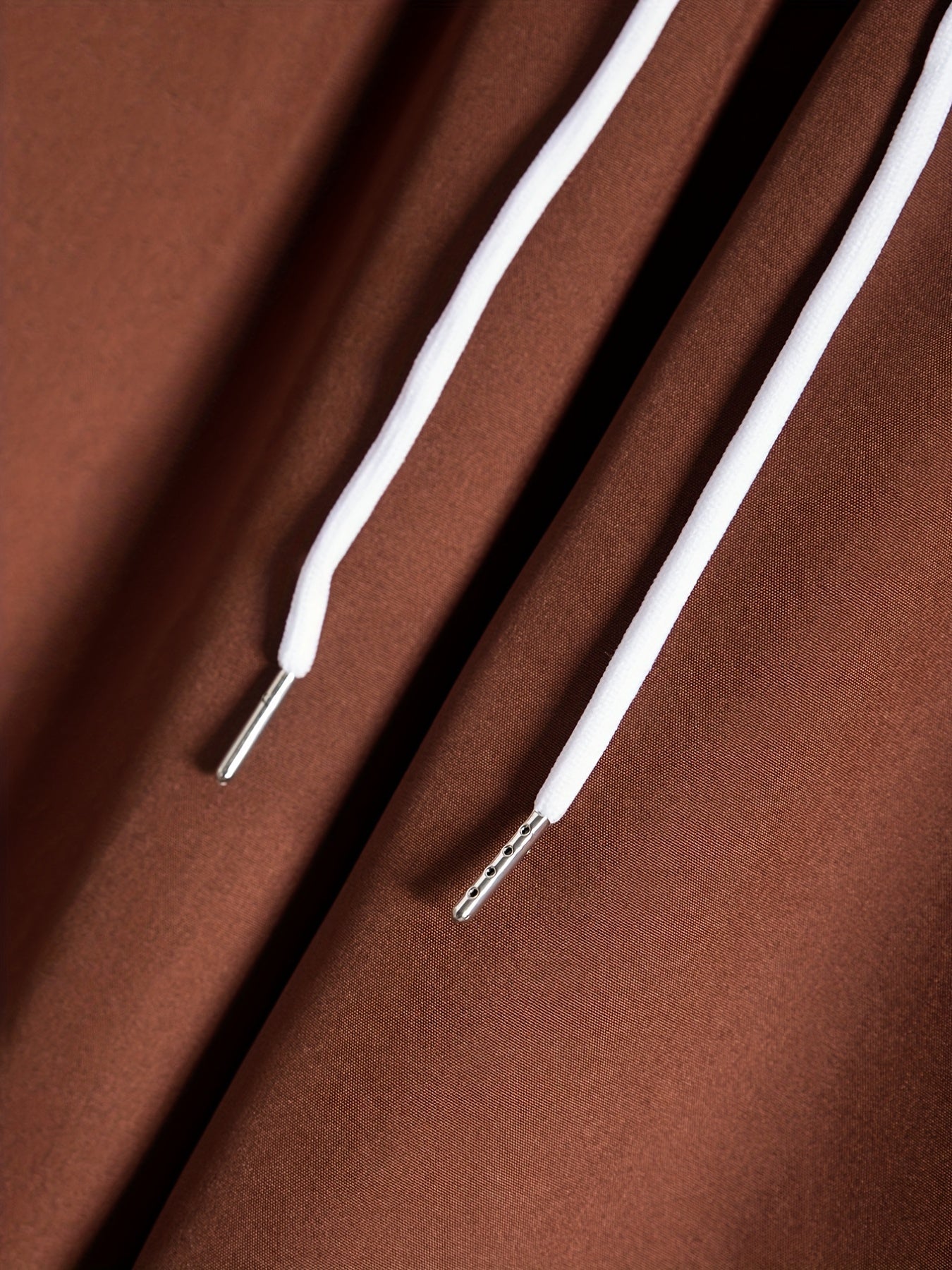 Set composto da camicia a maniche corte con colletto a revers e bottoni e pantaloncini con coulisse