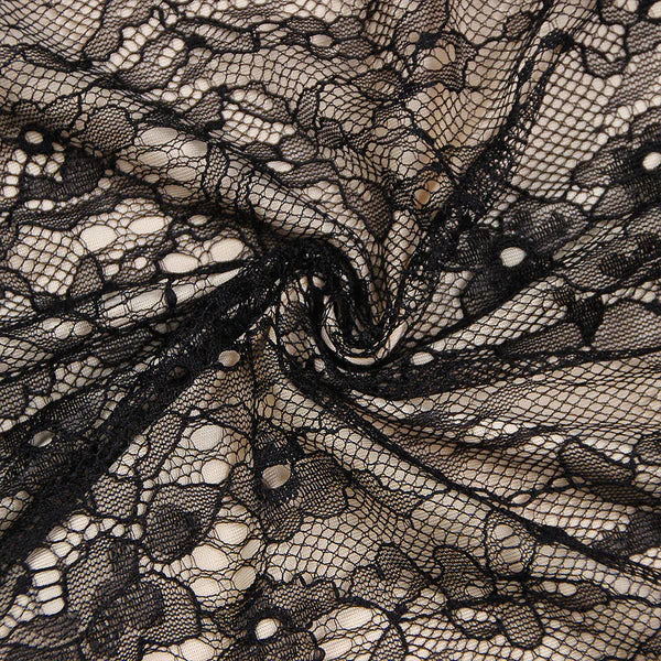 Tuta trasparente con scollo in pizzo