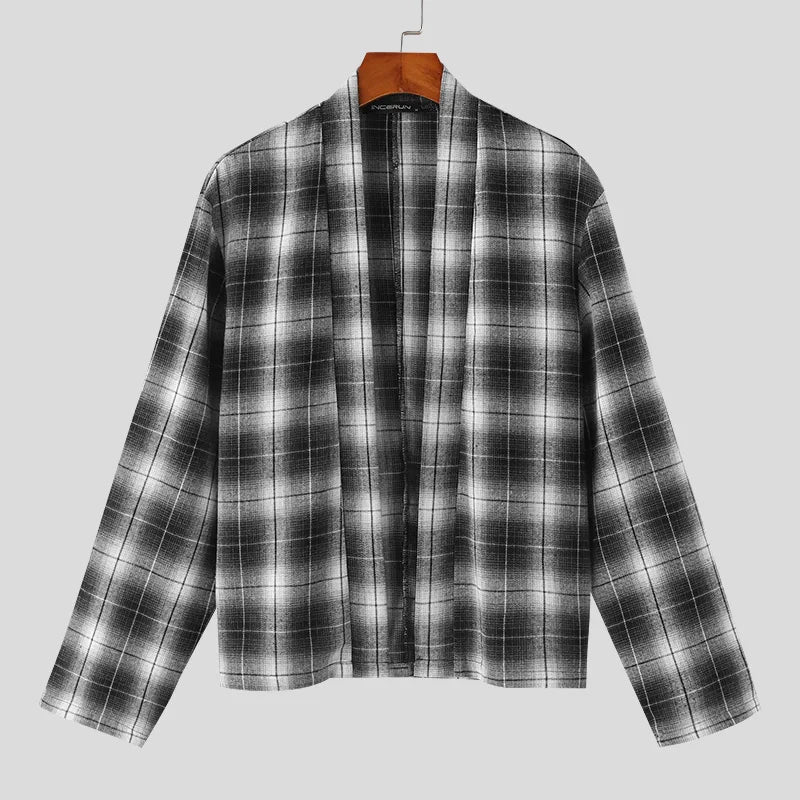 Cardigan a quadri con maniche lunghe e punto aperto e pantaloni con gonne irregolari