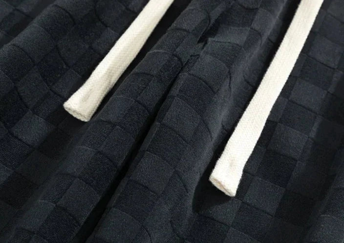 Pantaloni sportivi ampi con fantasia a scacchiera