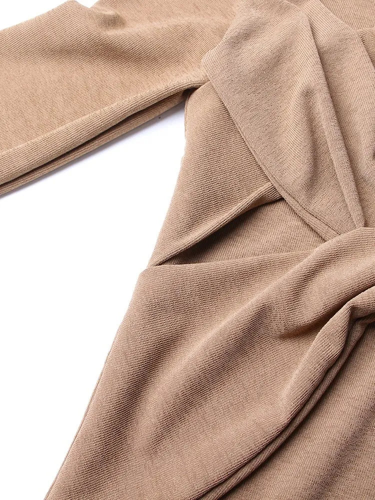 Abiti con paillettes divise in maglia incrociata