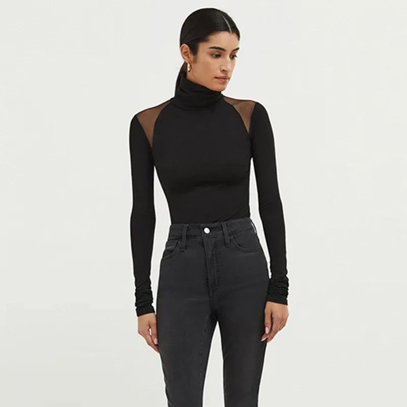 Top elegante con maniche lunghe
