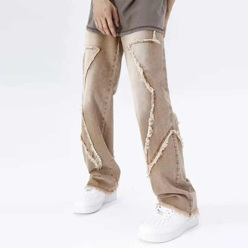 Jeans oversize strappati