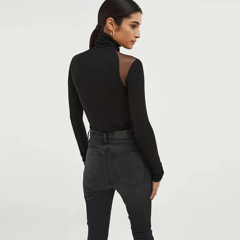 Top elegante con maniche lunghe