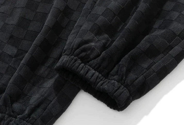 Pantaloni sportivi ampi con fantasia a scacchiera