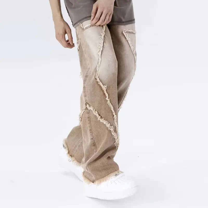 Jeans oversize strappati