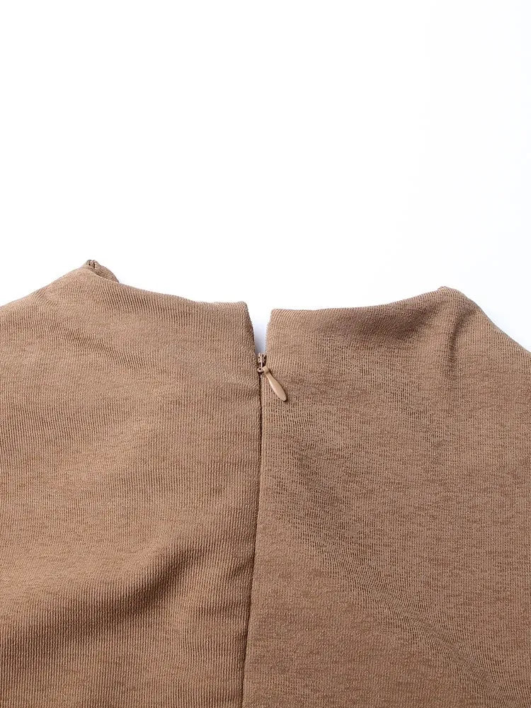 Abiti con paillettes divise in maglia incrociata