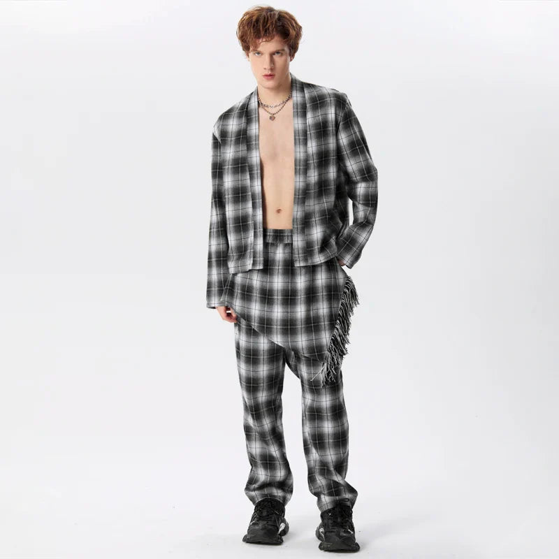 Cardigan a quadri con maniche lunghe e punto aperto e pantaloni con gonne irregolari