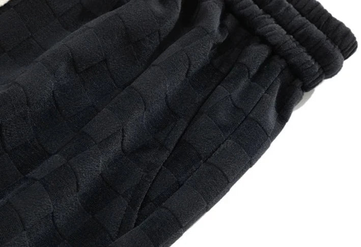 Pantaloni sportivi ampi con fantasia a scacchiera