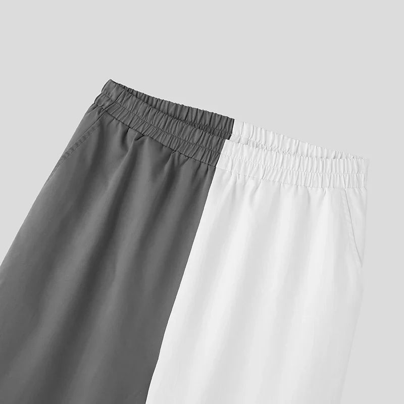 Camicia con revers e pantaloni con maniche lunghe e bottoni