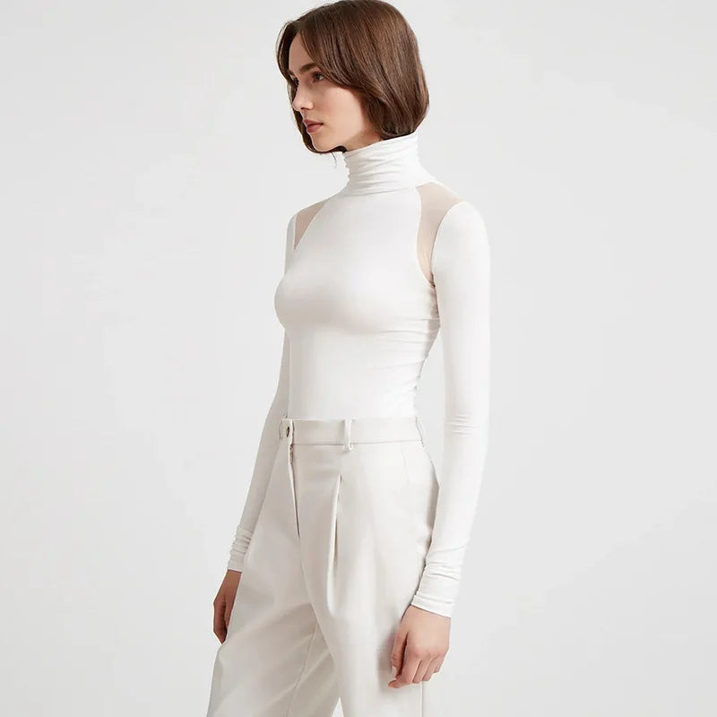 Top elegante con maniche lunghe