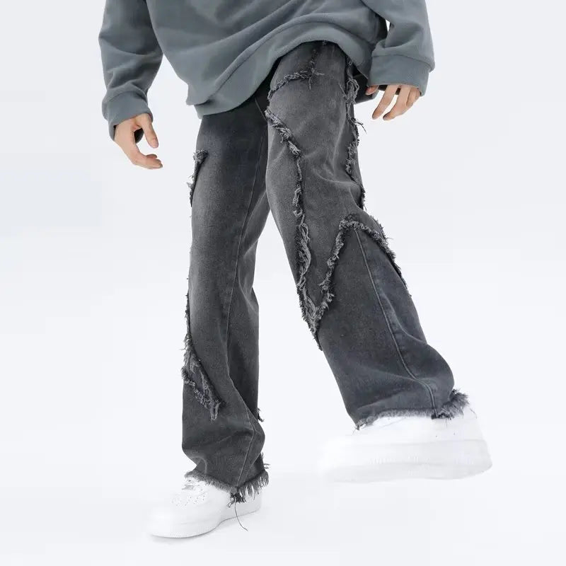 Jeans oversize strappati