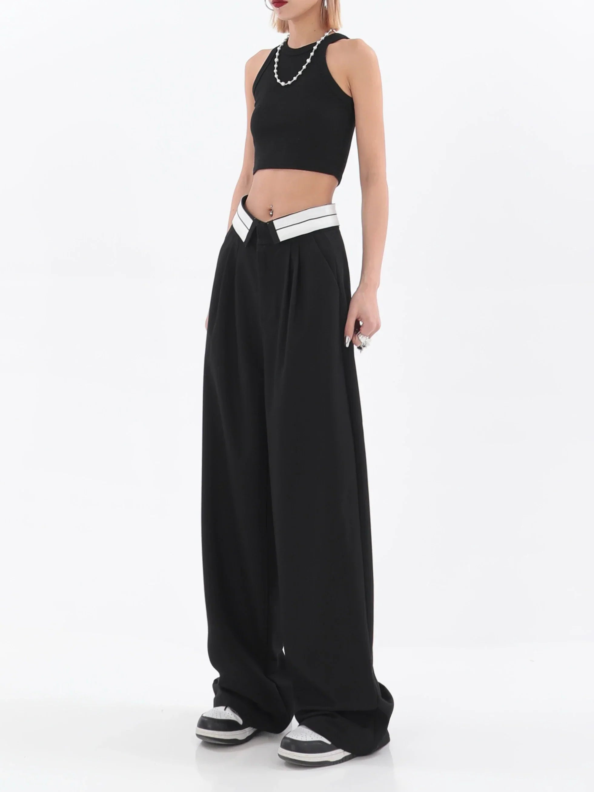 Pantaloni ampi a vita alta