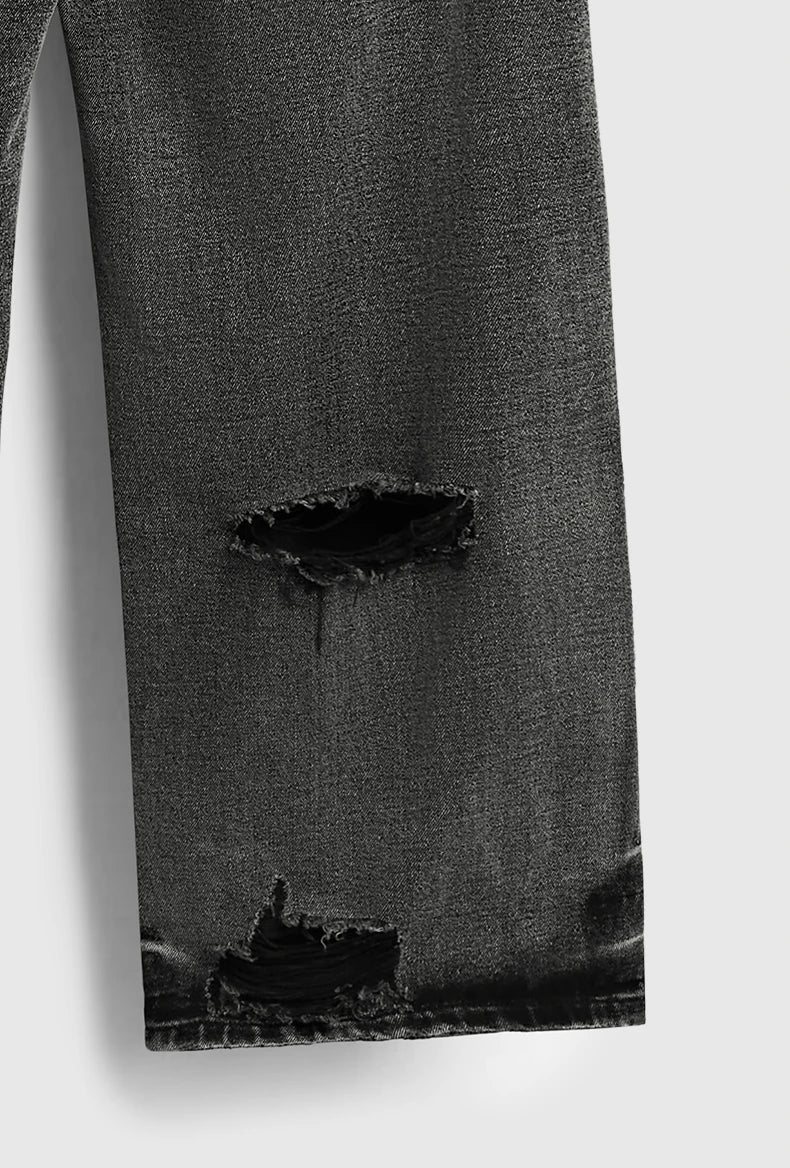 Jeans neri strappati