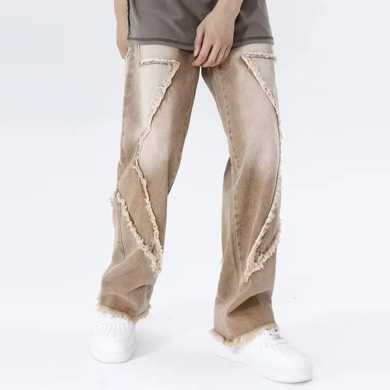 Jeans oversize strappati