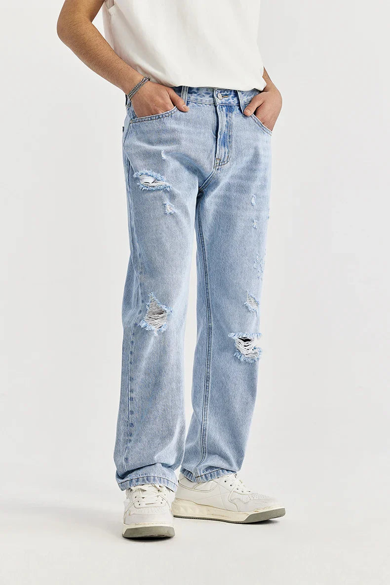 Jeans slim fit strappati