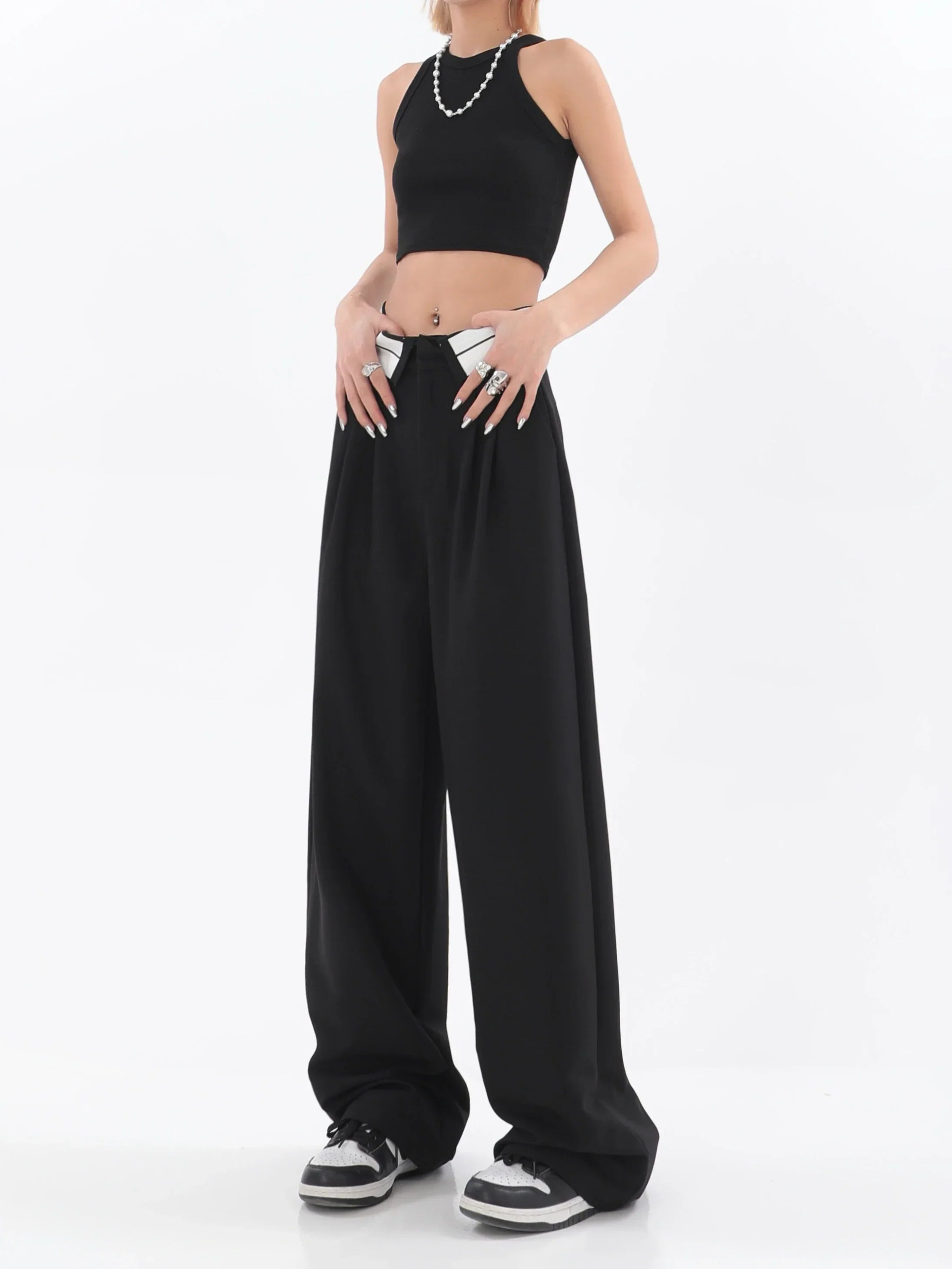 Pantaloni ampi a vita alta