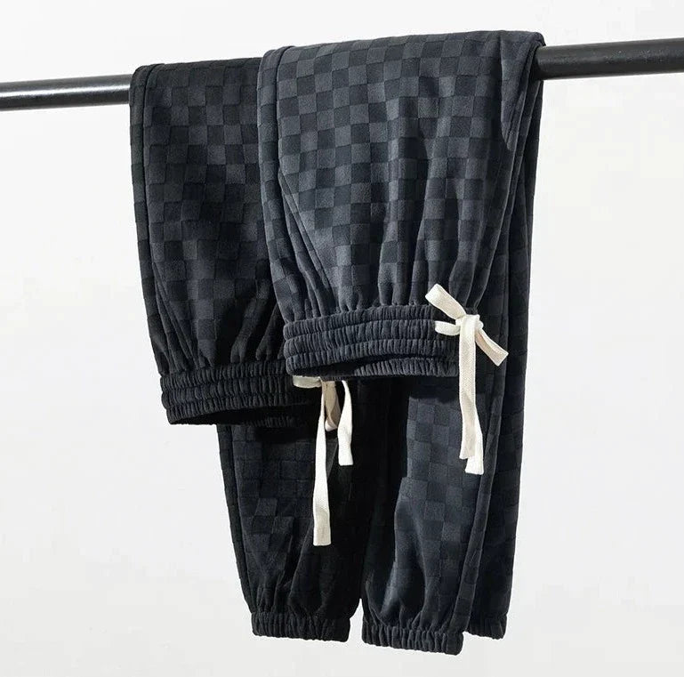 Pantaloni sportivi ampi con fantasia a scacchiera