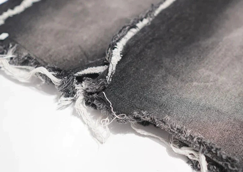 Jeans neri oversize strappati