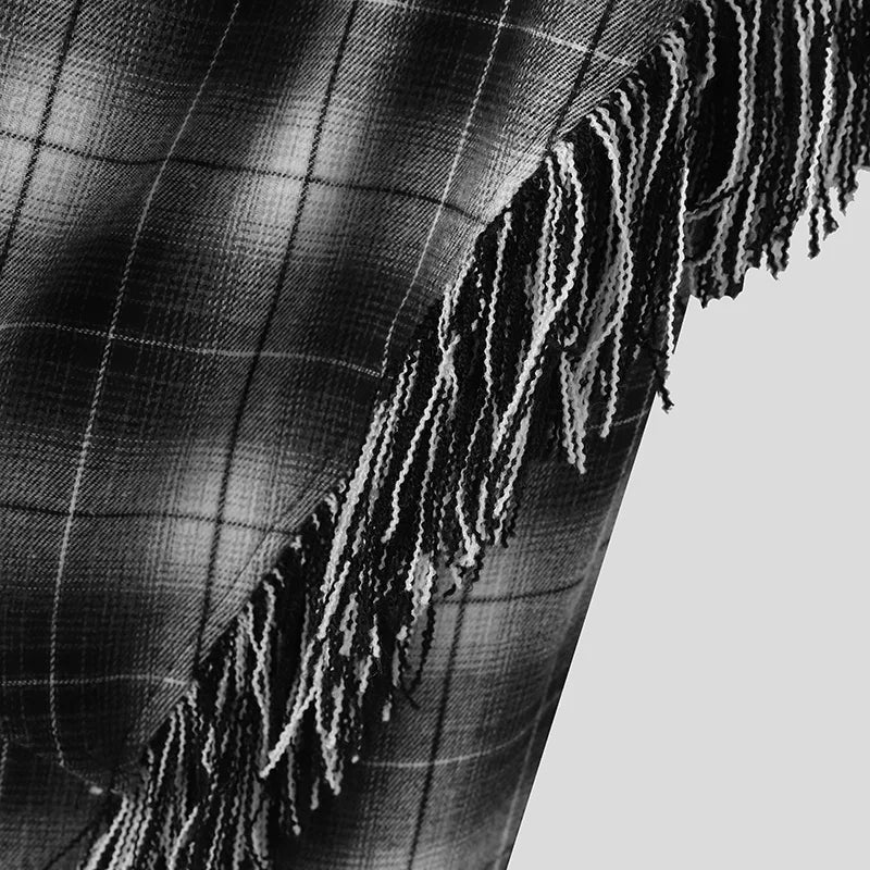 Cardigan a quadri con maniche lunghe e punto aperto e pantaloni con gonne irregolari