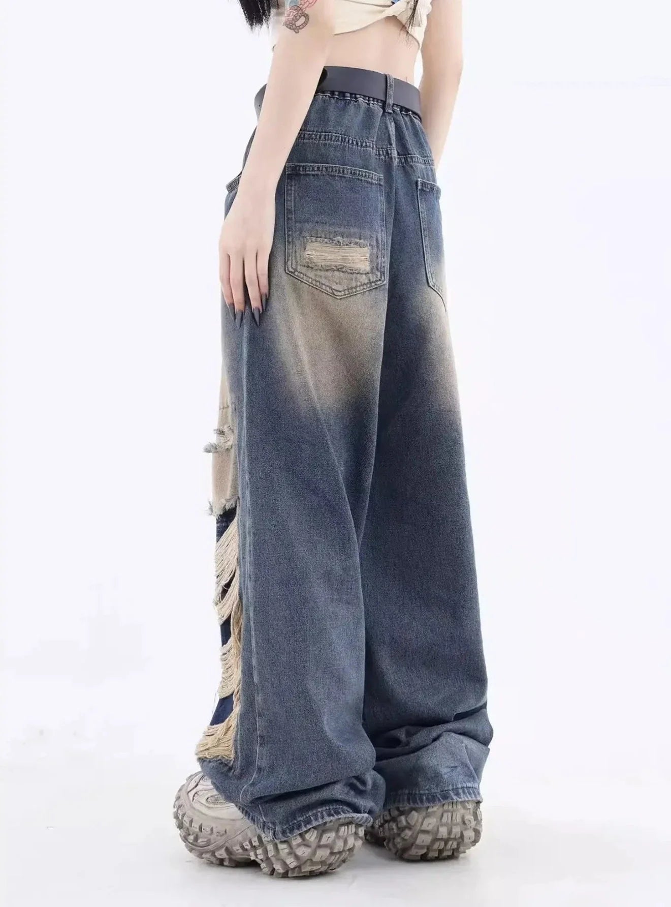 Jeans larghi strappati