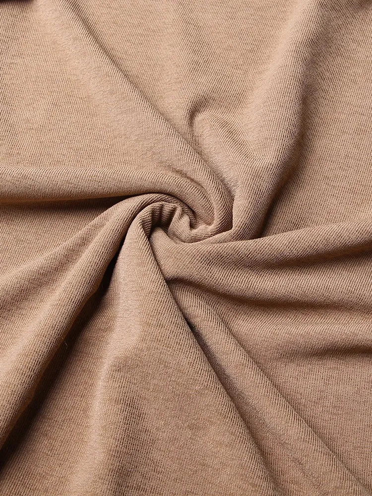 Abiti con paillettes divise in maglia incrociata