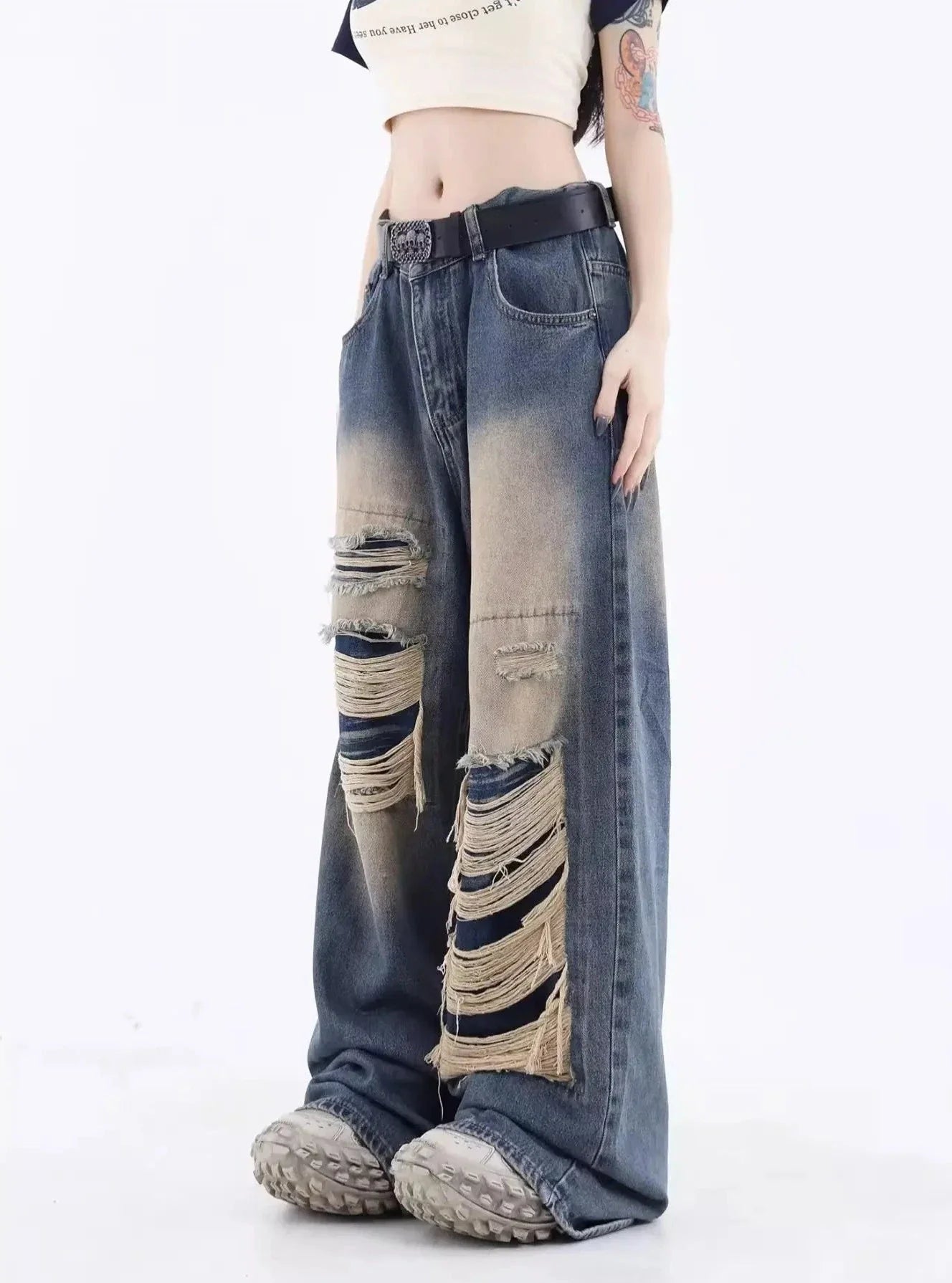 Jeans larghi strappati