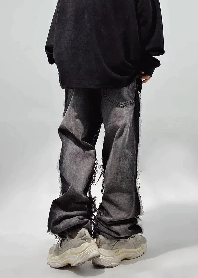 Jeans neri oversize strappati