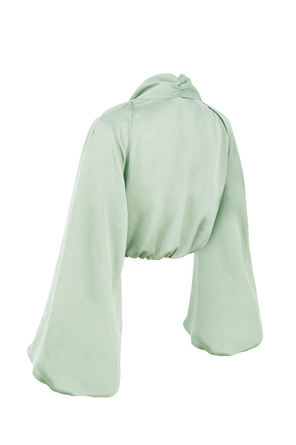 Top in blouson dal taglio profondo in raso di seta con gonna drappeggiata