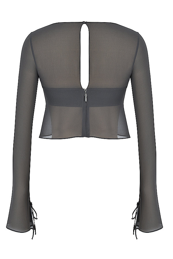 Top fluttuante a maniche lunghe Shadow e minigonna a strati