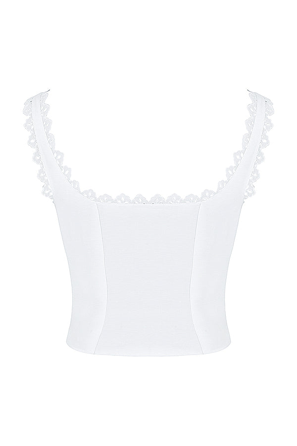 Top in pizzo bianco con minigonna a trapezio in lino