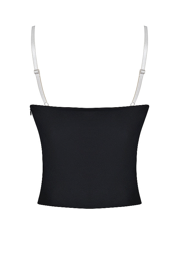 Top con ferretto nero e bianco sporco con minigonna