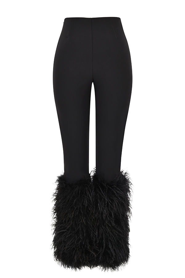 Corsetto di velluto nero con pantaloni cropped