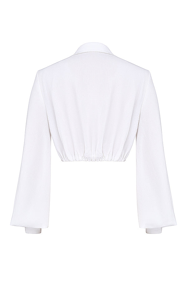 Top in blouson bianco con maxi gonna a pieghe