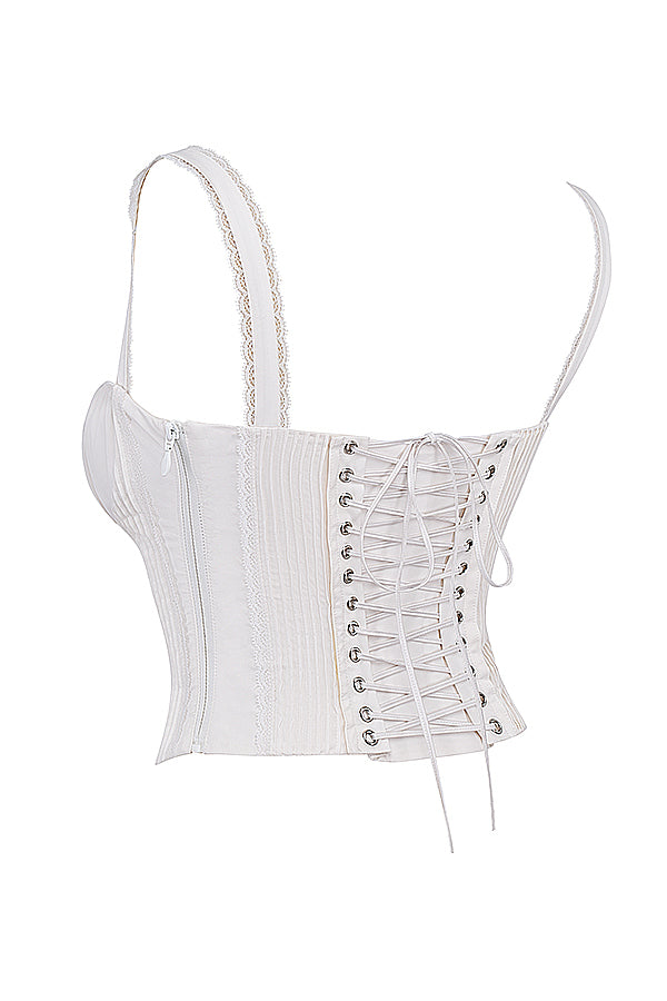 Corsetto in pizzo bianco sul retro