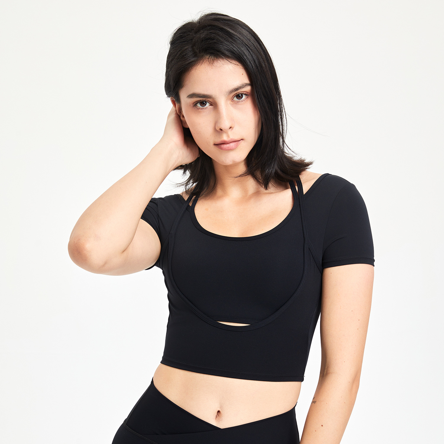 Top sportivo a maniche corte da donna
