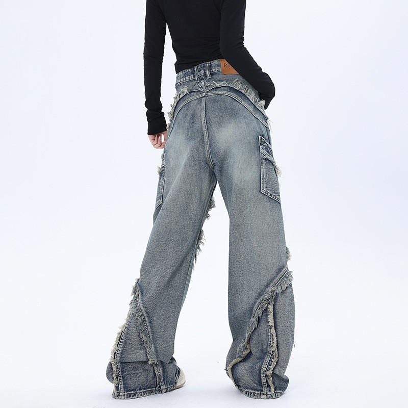 Jeans oversize strappati