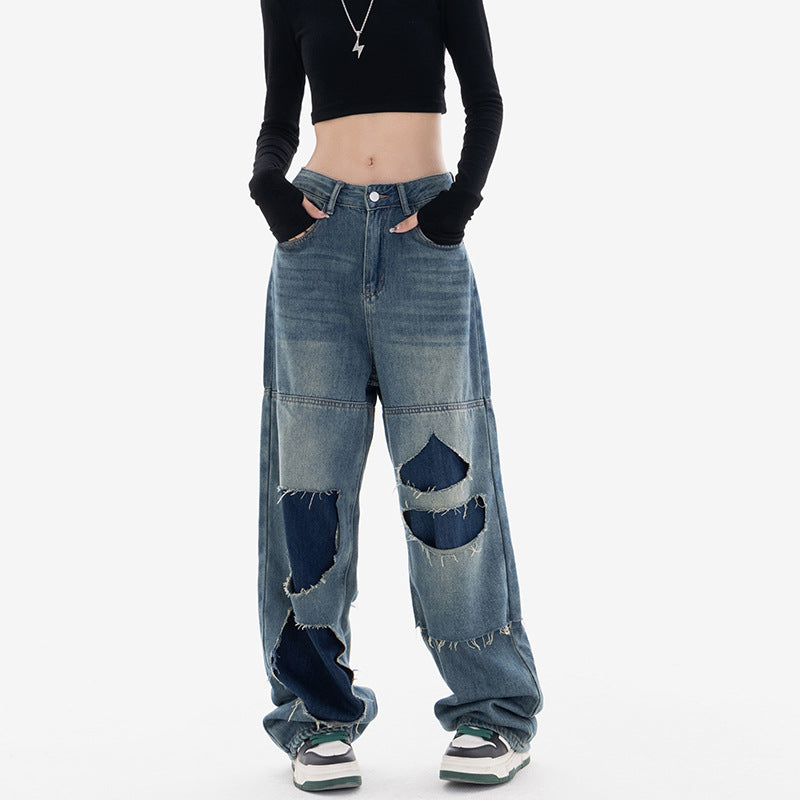 Jeans larghi strappati