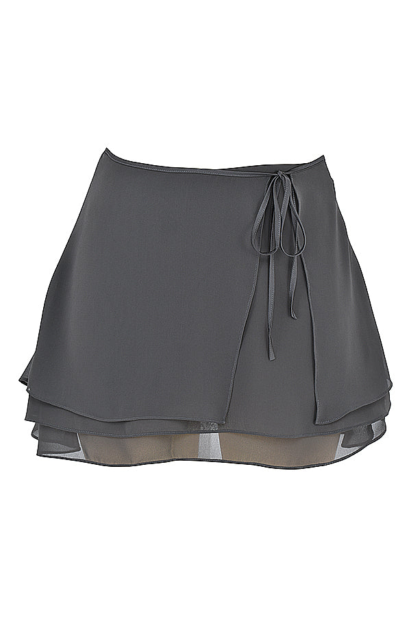 Top fluttuante a maniche lunghe Shadow e minigonna a strati
